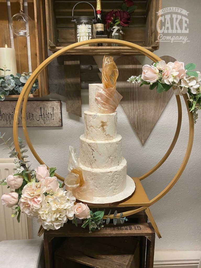 Concrete texture wedding cake with gold sail in hoop stand Tamworth West Midlands Staffordshire