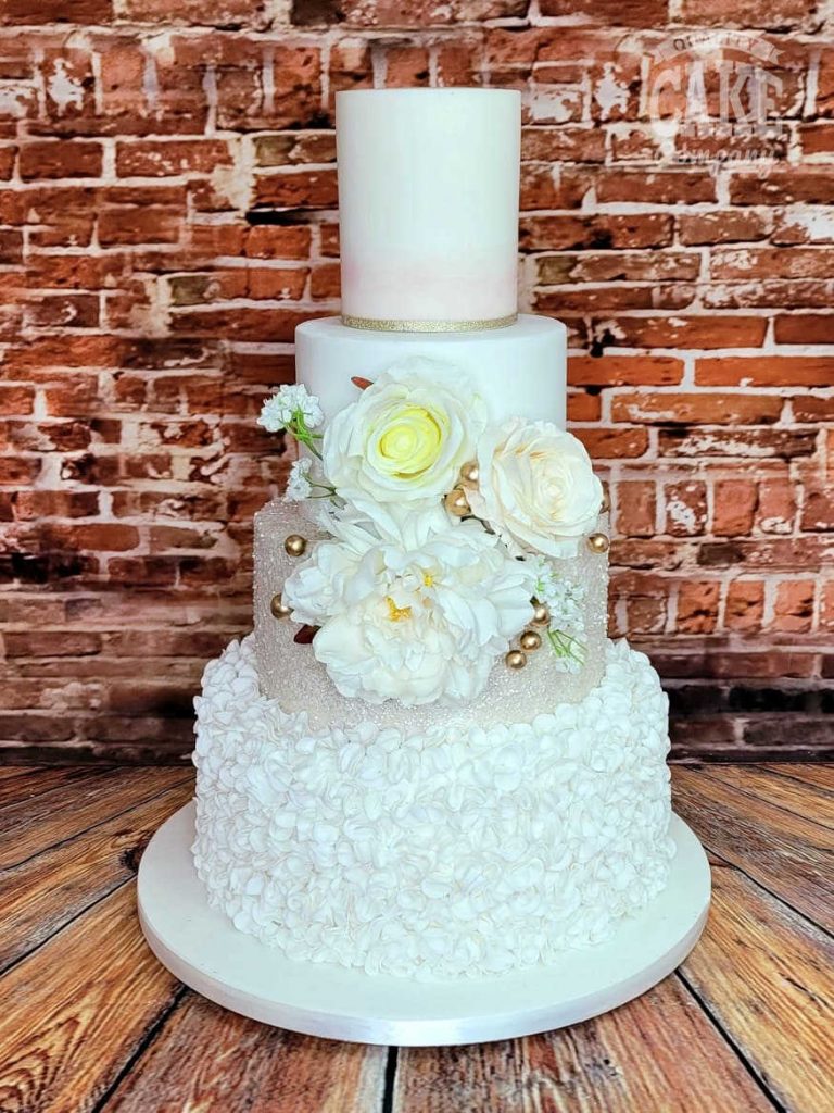 soft golf ruffles and ombre cake with large silk flowers four tier Tamworth West Midlands Staffordshire