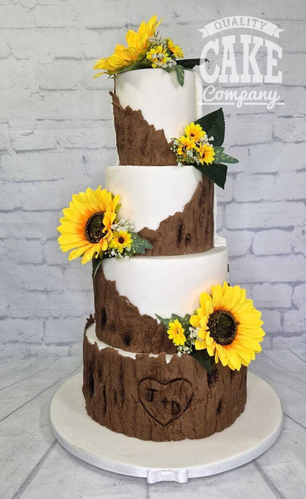 reveal wedding cake front bark rustic sunflowers