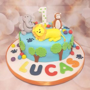 first birthday animal theme cake bright colours - Tamworth