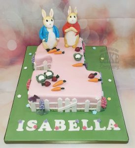 Number 1 shape pink Peter Rabbit theme cake children's first birthday - Tamworth