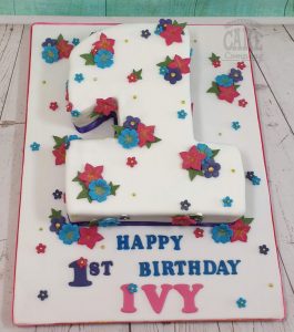 Number 1 shape floral cake children's first birthday - Tamworth