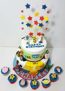 Two tier toy story theme cake and cupcakes - Tamworth