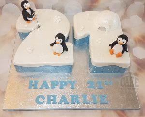 Number 21 shaped cake penguin theme 21st birthday - tamworth