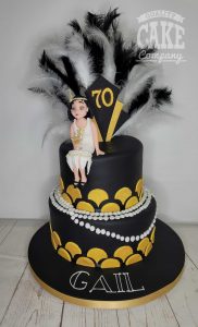 Two tier black and gold Gatsby inspired 70th birthday cake - Tamworth