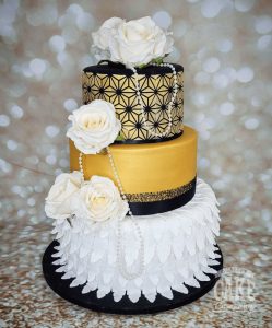 three-tier art deco black gold white feathers theme cake - tamworth