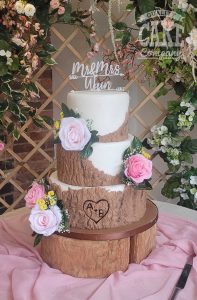 three tier bark reveal wedding cake with roses - Tamworth