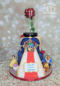 two tier beauty and beast inspired cake with red rose - Tamworth