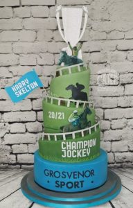 Large four tier celebratory corporate event cake harry skelton - tamworth