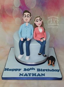 couple sitting on cake with dog - Tamworth