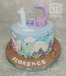 Cute pastel dinosaur first birthday cakes - tamworth