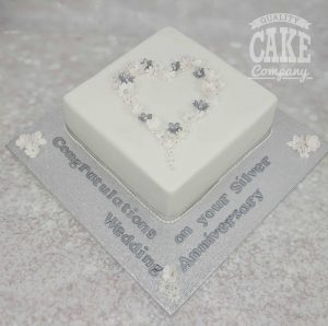 silver 25th anniversary floral cake