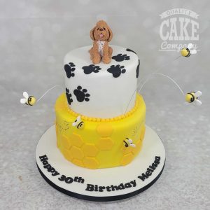 two tier dog and bees theme birthday cake - tamworth