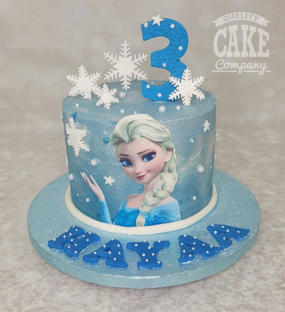 There are Little snow flakes coming out of Elsa's hand” is what my daughter  said about… | Frozen birthday party cake, Frozen birthday cake, Sunshine  birthday cakes