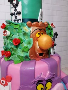 Four-tier alice in wonderland theme birthday cake - Tamworth