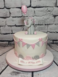 cute elephant holding balloon bunting first birthday cake - tamworth