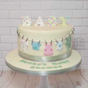 Baby shower washing line neutral cake - Tamworth
