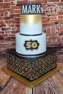 three tier modern black gold and white geometric 50th birthday cake - Tamworth