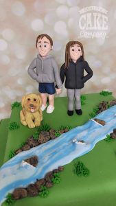 couple walking dog birthday cake - Tamworth