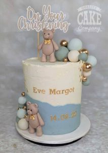 Tall brown bear and balls christening cake - tamworth