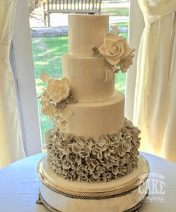 four tier soft blue ruffle wedding cake - Tamworth