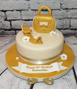 gold shoe and handbag theme cake - tamworth