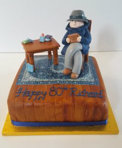 Grandad reading in his chair hobby cake - Tamworth
