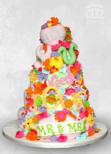 Bright colourful All you need is love groovy wedding cake Tamworth West Midlands Staffordshire