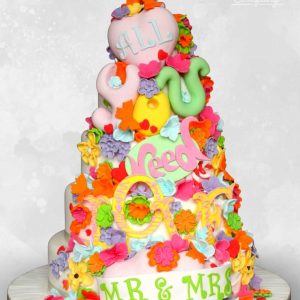 Bright colourful All you need is love groovy wedding cake Tamworth West Midlands Staffordshire