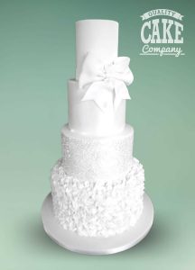 Four tier tall all white bows ruffles and shimmer Tamworth Staffordshire West Midlands