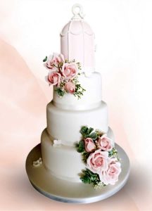 Pretty soft white and pink four tier wedding cake bird cage Tamworth West Midlands Staffordshire