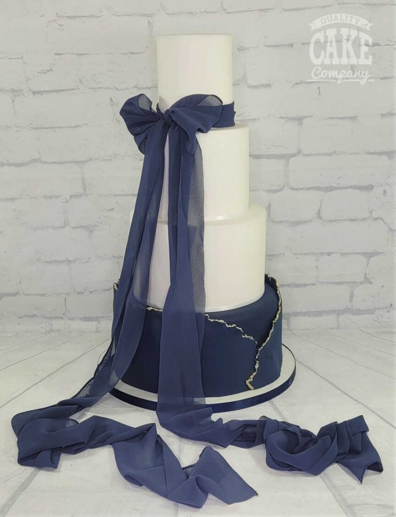Contemporary blue chiffon long bow torn gold four tier Tamworth West Midlands Staffordshire