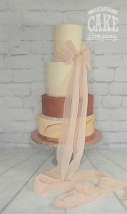 Contemporary wedding rose and ivory chiffon ribbon marble four tier Tamworth West Midlands Staffordshire