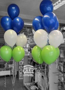 two bunches of corporate colour latex balloons