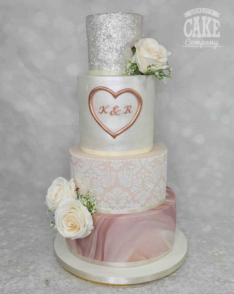 Four tier wedding cake. Marble, stencil, glitter, mauve white rose gold Tamworth West Midlands Staffordshire