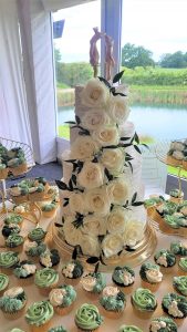 Four tier ribbed buttercream rose cascade wedding green with cupcakes Tamworth West Midlands Staffordshire