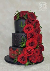 Fresh red rose cascade three tier wedding with quilting and lace black cake Tamworth West Midlands Staffordshire