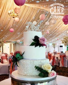 Glitter white wedding with blush pink flowers at venue New Hall Hotel Tamworth West Midlands Staffordshire