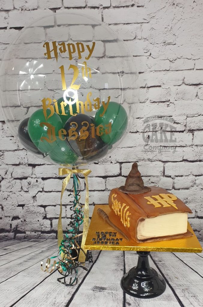 Harry potter book cake with matching balloons - Tamworth