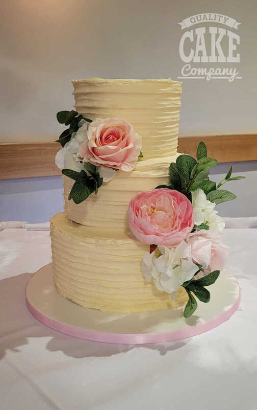 Lea Marston ribbed buttercream with silk roses three tier wedding cake Tamworth West Midlands Staffordshire
