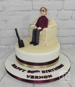 Man watching TV 80th birthday cake - Tamworth