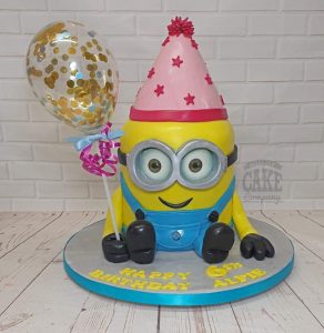 Minion sculpted novelty cake in party hat - tamworth