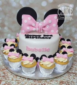 minnie mouse bow and ears cake with cupcakes - Tamworth