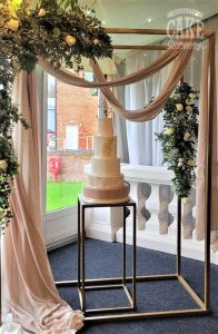 Nude and rose gold wedding cake in extra stand at Alrewas Hayes Tamworth West Midlands Staffordshire
