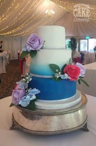 Ombre blue wedding cake three tier with bright silk flowers Tamworth West Midlands Staffordshire