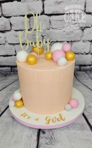 Oh baby peach balls gold theme cake - Tamworth
