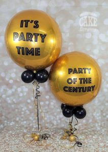 Party time gold orb balloons for corporate events - Tamworth