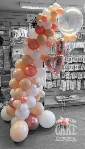 Organic self-supporting demi arch rose gold blush balloon display with bubble -Tamworth