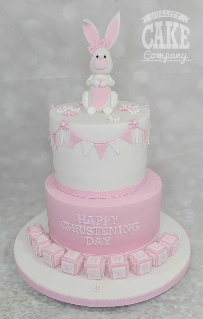 two tier pink and white bunny bunting blocks christening cake - Tamworth