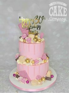 two tier pink and gold drip cake - tamworth